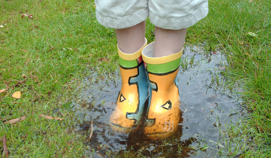 child with wellingtons