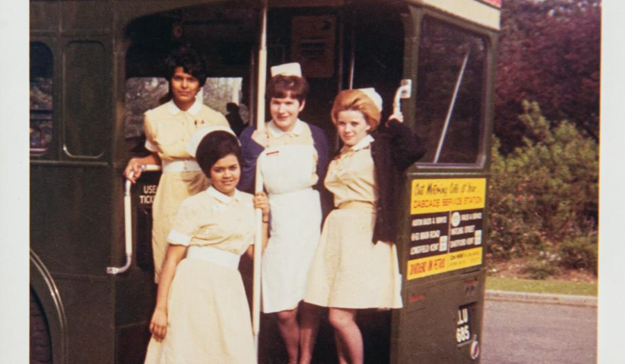 An old image of Nurses on a bus