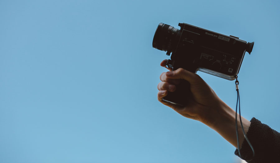 hand holding a camera