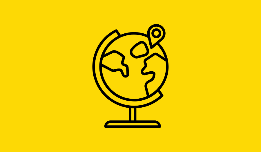 Icon of a globe with a location pinpoint on a yellow background