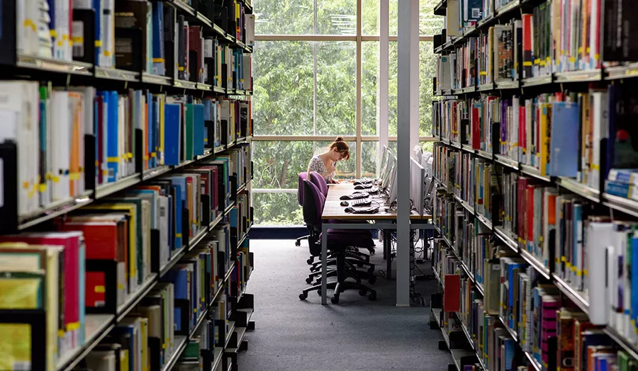 A row of bookshelves in the postgraduate library.