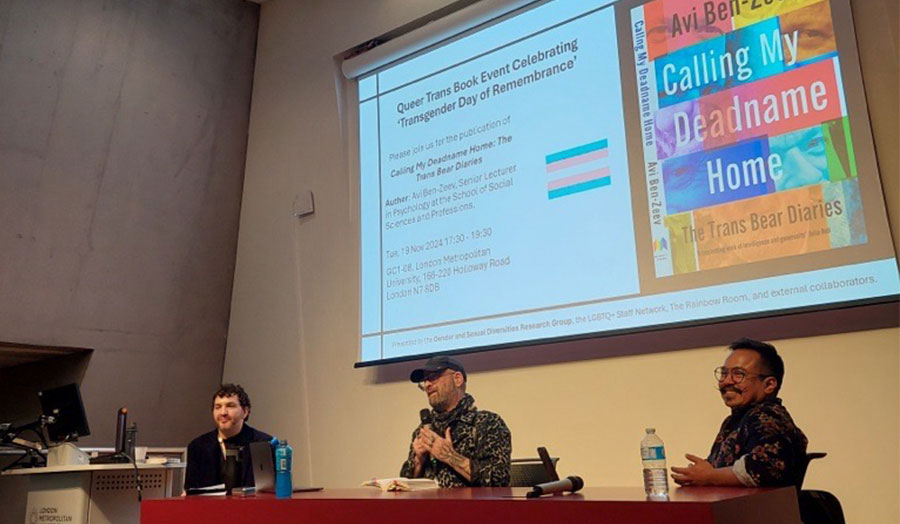 Three people during a panel discussion