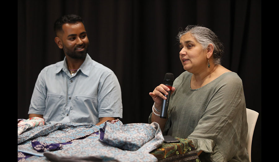 Two people in conversation at an event