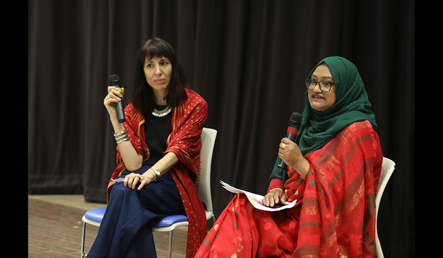 Two people in conversation at an event